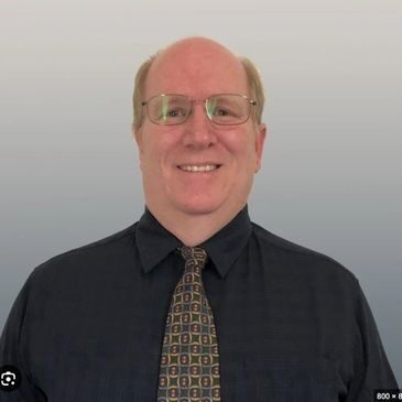 Portrait of man with patterned tie